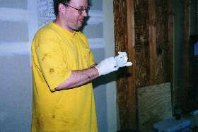 Trying on the rubber gloves