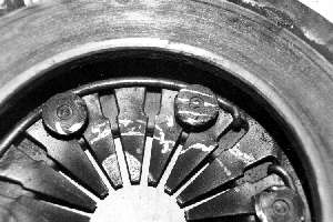 Pressure plate with marks of damage