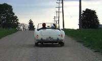 Topless MGA on a side road