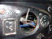 Rotating flag on speedometer cable to count thte turns