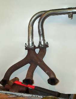 Manifold and header pipe assembly