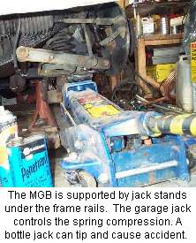 floor jack under front suspension