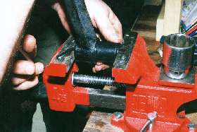 Set up new bushing for squeeze in vice.