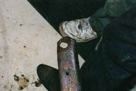 Worn hole in right side arm.