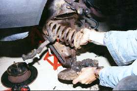 Removing coil spring