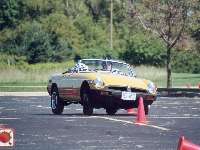 Rubber bumper MGB negotiating autox course
